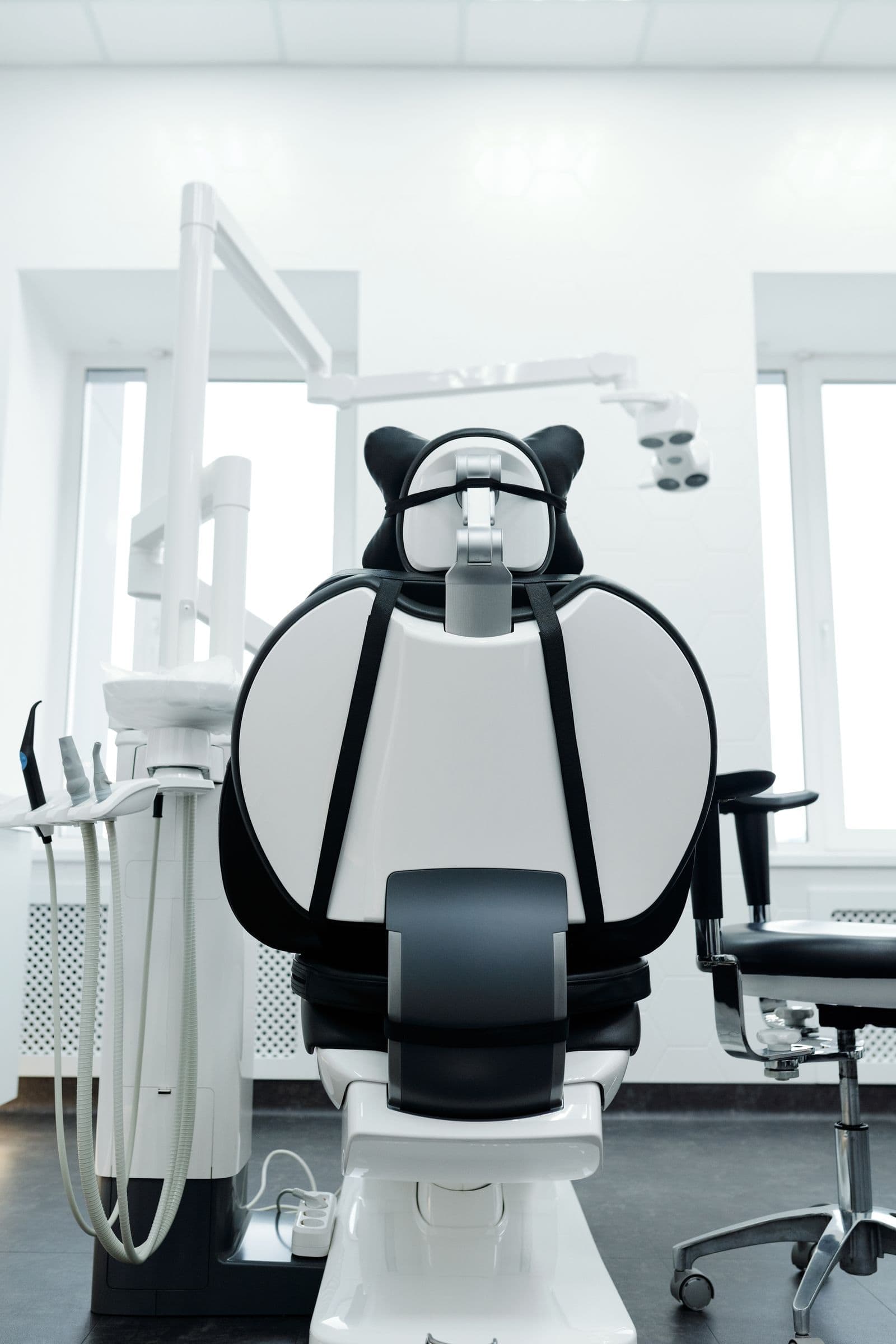 A dental chair beside a bright window, the kind of operatory we film